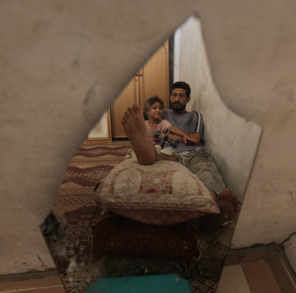 Father and Daughter During the Visit in Gaza by Sadhaqa